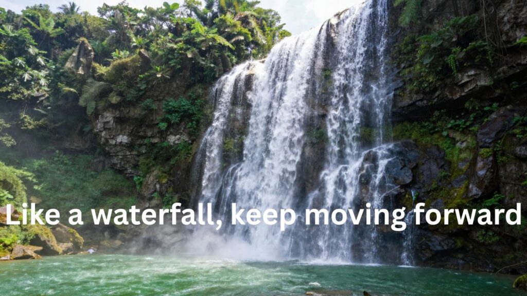 Instagram Captions for Waterfall Pics – scenic waterfall view with flowing water, lush green nature background, and aesthetic vibe perfect for Instagram photography.